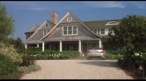 A house with a car out front.