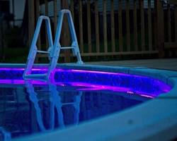 Image of Pool illuminated with linear flag lights