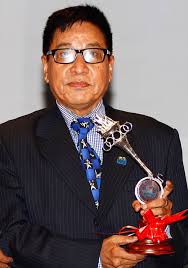 Former Nepal National team coach and long time Football servant Bhim Thapa receives Life Time achievement award presented in NSJF Pulsar sports award. - Bhim-Thapa-NSJF