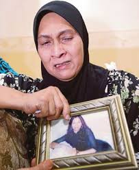 Sharom Ibrahim, 56, mother of MH17 cabin crew, Nur Shazana Mohamed Salleh when met at her house in Bukit Gedung, Bayan Baru Mohammad Mikail Ong - hit23.transformed_1