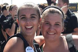 Charlotte Murrell and Brandi Moore were ready to go with smiles and excitement during warm-up&#39;s before preliminary&#39;s Saturday at Papa John&#39;s Stadium. - 37074
