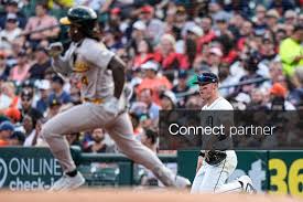 Licensable picture: Detroit Tigers first baseman Spencer Torkelson (20) watches Athletics right fielder Lawrence Butler (4) runs past first base