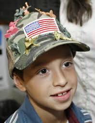 david-morales-toy-soldier-hat.JPG Stew Milne, Associated PressDavid Morales, 8, from Coventry, R.I., wears his decorated Army hat during an appearance on ... - david-morales-toy-soldier-hatjpg-46eee3e6118e9cb1_large