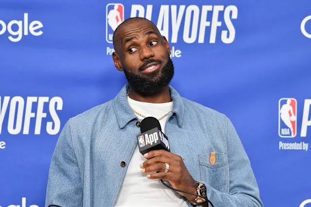 LeBron James unveils first Philadelphia 76ers jersey after signing two-year deal worth $7,946,884; will wear No. 23.