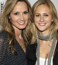 With less than a week to go before their wedding day, Chely Wright and her fiancée Lauren Blitzer are making the usual preparations. - chelywlaurenb200-081511