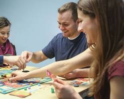 person playing a board game