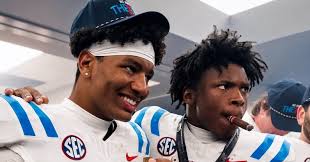 Ole Miss pulled an all-nighter to retain Trinidad Chambliss and Kewan Lacy