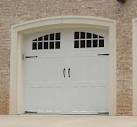 Steel carriage garage doors