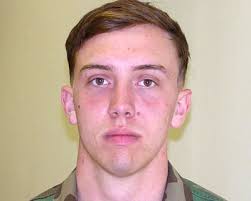 Army Spc. Benjamin Wilkinson saw taking part in a flag-placing ceremony at the graves of Americans killed during the Korean War as a way to say &#39;thank-you.&#39; - 4124376651