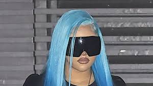 North West, 13, turns heads with new thigh piercings and electric blue hair in Malibu