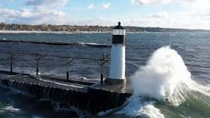 Monster Waves crashing into Lighthouse