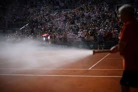 Tennis-French Open gets under way with Coldplay song on strings, heat on clay