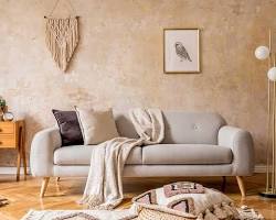 Image of painter creating a unique textured finish on a living room wall