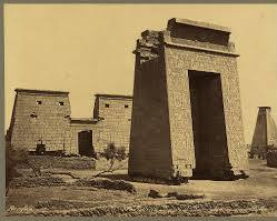 Image of pylon of the Temple of Khonsu, with its impressive reliefs of Ramses III.