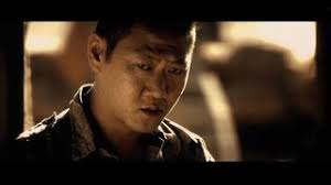 In Spy Game, when Tom Bishop was a sniper in Vietnam, he had a partner (his spotter) who, as far as I can tell, is named Tran, played by Benedict Wong: - AQ0c2m