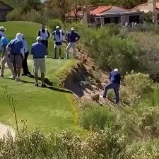 Watch: John Daly falls down steep slope as caddie jumps to the rescue