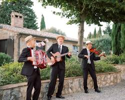 Image of cozy Italian restaurant with a live band playing traditional Italian music