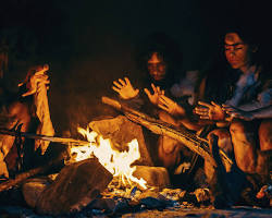 Image of Early humans using fire