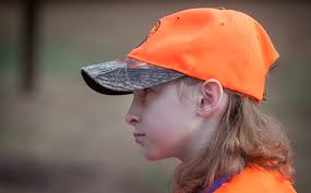 Angel Thompson dons her orange hunting vest and cap ... - 57639-d