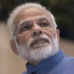 Modi unveils road, power projects