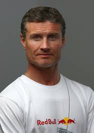 David Coulthard of Great Britain and Red Bull Racing poses at the Red Bull Technology Factory on March 19, ... - David%2BCoulthard%2BPortrait%2BSession%2BRed%2BBull%2BwREGwxmyMDwl
