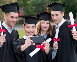 Image of group of happy Indian students celebrating their graduation