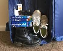 Packing heaviest items at the bottom of suitcase