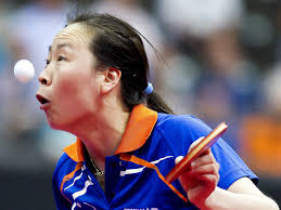 Li Jiao of the Netherlands plays against Spain&#39;s Shen Yanfei during their second round game at the Table Tennis World Championships in Rotterdam - table-tennis-2_1893709i