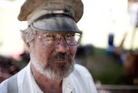 Jan Manning from Fort Collins, Colo. poses for a portrait inside a tent where he works as a blacksmith during the first day of Fort D.A. Russell Days on ... - CFD_0027