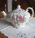 2 parrots singing and talking teapot toy