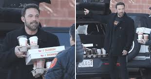 Ben Affleck serves orders at Medford Dunkin' drive-thru before delivering donuts at neighboring fire station