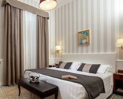 Hotel Nord Nuova Roma room interior (由 AI 生成)