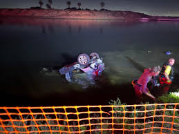 Woman killed when SUV struck by car and left upside down in Huntington Beach wetlands