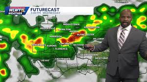 News Journal topic graphic showing rain clouds over Cincinnati skyline