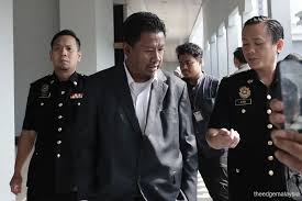 Former UBB Investment Bank CEO Razlan Raghazli charged with cheating RM139 million bank investment; deception involved misrepresentation of legal advice.