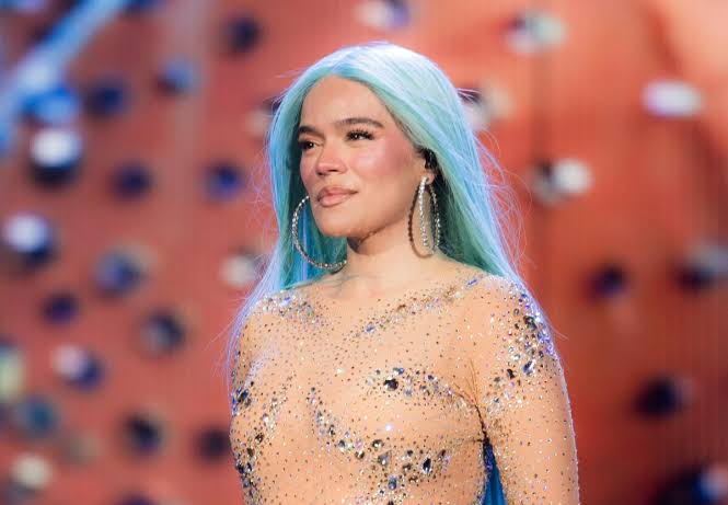 Karol G says '+57' lyrics perceived as sexualizing minors were 'taken out  of context'