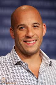 As if shooting a movie scene, actor Vin Diesel was riding his motorcycle through Hollywood, CA, when the car in front of him lost control, rolling several ... - Vin_Diesel