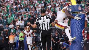 Stefon Diggs celebrating a touchdown for the Washington Commanders against the Philadelphia Eagles