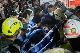 Rescuers race against the clock in Colombia earthquake response, straining new government as 7.4 quake kills at least 181