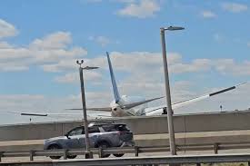 Plane Hits Light Post and Damages Tractor-Trailer at Newark Airport