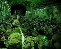 person standing amidst a battlefield