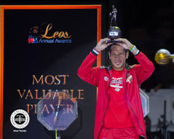 Hình ảnh về June Mar Fajardo holding the MVP trophy