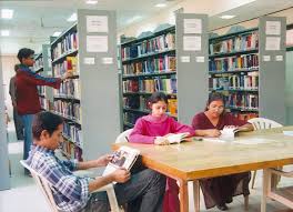 Image result for gadis melayu membaca di perpustakaan awam