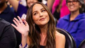 Sportscaster Kay Adams stuns in strapless, ab-baring outfit