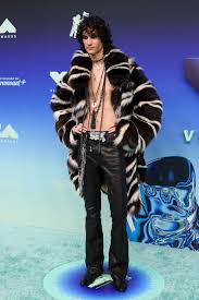 Sombr wearing a custom ERL faux fur jacket at the 2026 MTV VMAs