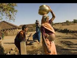 Image result for pregnant woman in slum