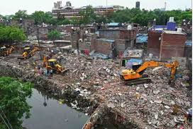 Delhi News: दिल्ली के तैमूर नगर में बुलडोजर एक्शन, 100 से अधिक घर हुए ध्वस्त
