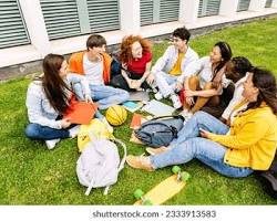 Image of student relaxing with friends, laughing