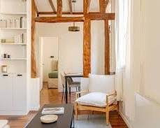 Image de modern luxury apartment paris lounge suitcases travel airbnb rental louvre rivoli