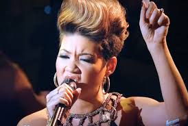 Canadian/Jamaican billionaires Michael Lee-Chin and Raymond Chang got into a bidding war for a performance by Tessanne Chin. - Tessanne-Chin-bob-marley-redemption-song